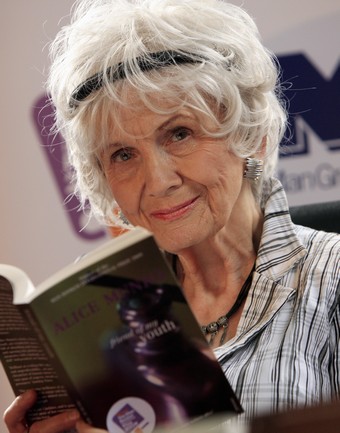 Canadian author Alice Munro holds one of